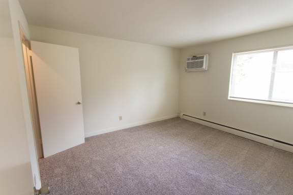 This is a picture of the primary bedroom in a 748 sq foot 2 bedroom, 1 bath apartment at Red Bank Reserve in the Madisonville neighborhood of Cincinnati, Ohio.