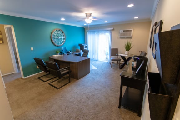 This is a picture of the living room (and Leasing Office) in a 755 square foot 2 bedroom aprtment at Romaine Court Apartments in Cincinnati, OH.