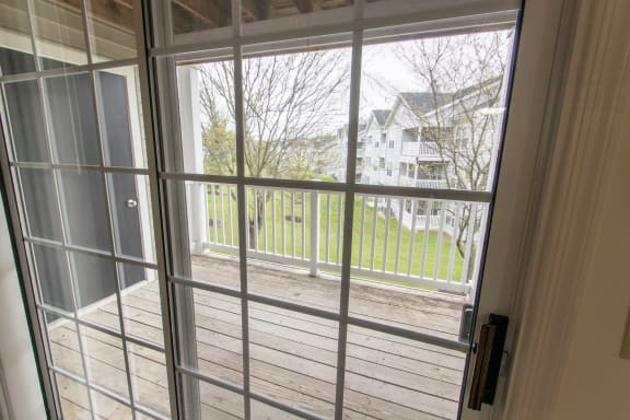 This is photo of the balcony in the 852 square foot, 1 bedroom Fairlawn floor plan at Trails of Saddlebrook Apartments in Florence, KY.