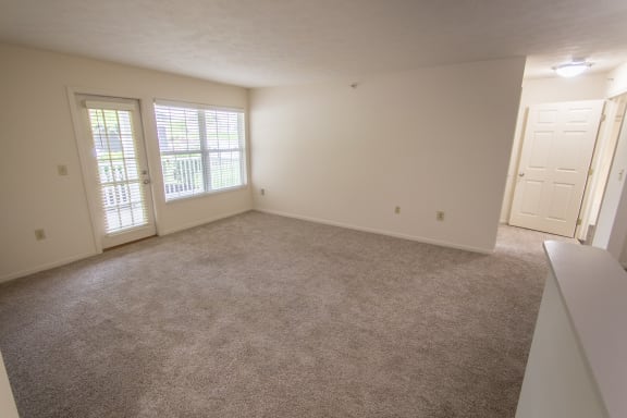 This is photo of the living room in the 1056 square foot, 2 bedroom Gainsway floor plan at Trails of Saddlebrook Apartments in Florence, KY.