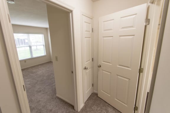 This is photo of the hallway in the 1056 square foot, 2 bedroom Gainsway floor plan at Trails of Saddlebrook Apartments in Florence, KY.