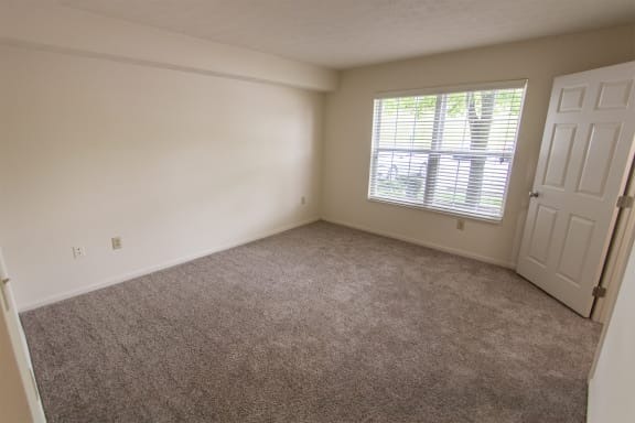 This is photo of the primary bedroom in the 1056 square foot, 2 bedroom Gainsway floor plan at Trails of Saddlebrook Apartments in Florence, KY.