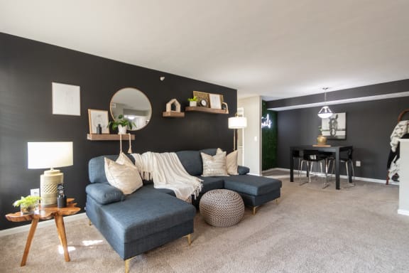 This is a photo of the dining room from the living room in the 1226 square foot 3 bedroom, 2 bath Hambletonian at Trails of Saddlebrook Apartments in Florence, KY.