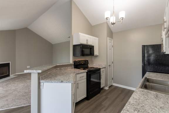 This is photo of the kitchen in the 852 square foot, 1 bedroom, 1 bath Fairlawn floor plan at Trails of Saddlebrook Apartments in Florence, KY.