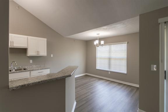 This is photo of the dining area in the 852 square foot, 1 bedroom, 1 bath Fairlawn floor plan at Trails of Saddlebrook Apartments in Florence, KY.