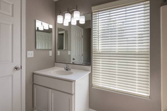 This is photo of the bathroom vanity in the 852 square foot, 1 bedroom, 1 bath Fairlawn floor plan at Trails of Saddlebrook Apartments in Florence, KY.