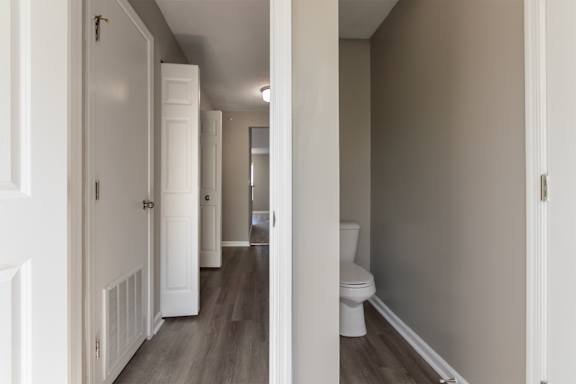 This is photo of the water closet and hallway  in the 852 square foot, 1 bedroom, 1 bath Fairlawn floor plan at Trails of Saddlebrook Apartments in Florence, KY.