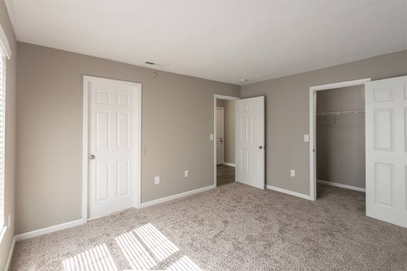 This is photo of the bedroom in the 852 square foot, 1 bedroom, 1 bath Fairlawn floor plan at Trails of Saddlebrook Apartments in Florence, KY.