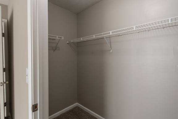 This is photo of the bedroom closet in the 852 square foot, 1 bedroom, 1 bath Fairlawn floor plan at Trails of Saddlebrook Apartments in Florence, KY.