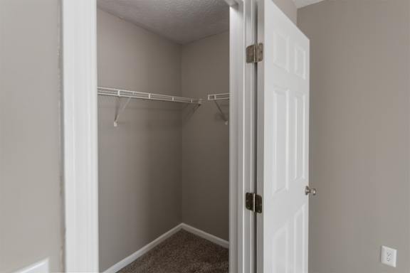 This is photo of the bedroom closet in the 852 square foot, 1 bedroom, 1 bath Fairlawn floor plan at Trails of Saddlebrook Apartments in Florence, KY.