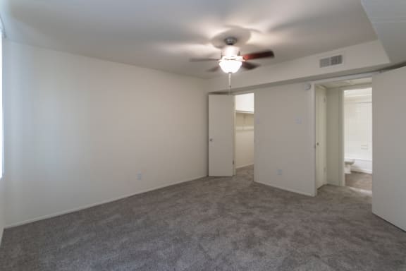 This is a photo of the second bedroom in the 963 square foot 2 bedroom, 2 bath apartment at The Summit at Midtown Apartments in Dallas, TX.