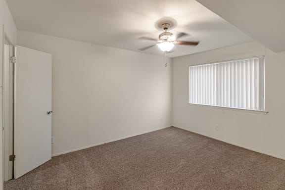 This is a photo of the bedroom in the 486 square foot 1 bedroom apartment at The Summit at Midtown Apartments in Dallas, TX.