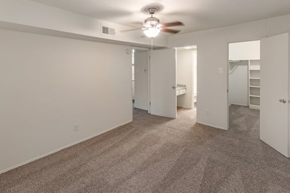 This is a photo of the bedroom in the 486 square foot 1 bedroom apartment at The Summit at Midtown Apartments in Dallas, TX.