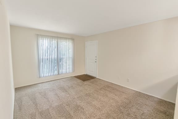 This is a photo of the living room in the 558 square foot 1 bedroom apartment at The Summit at Midtown Apartments in Dallas, TX.