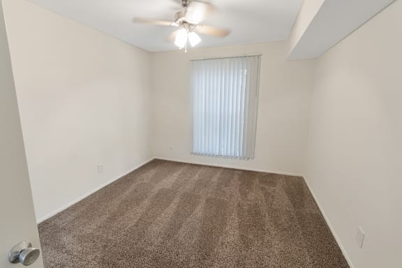 This is a photo of the bedroom in the 558 square foot 1 bedroom apartment at The Summit at Midtown Apartments in Dallas, TX.