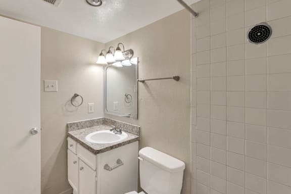 This is a photo of the bathroom in the 558 square foot 1 bedroom apartment at The Summit at Midtown Apartments in Dallas, TX.