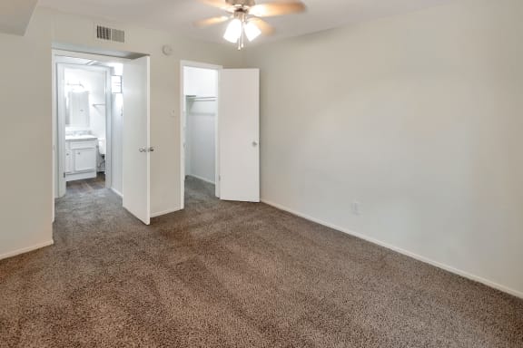 This is a photo of the bedroom in the 558 square foot 1 bedroom apartment at The Summit at Midtown Apartments in Dallas, TX.