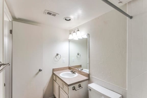 This is a photo of the bathroom in the 576 square foot 1 bedroom apartment at The Summit at Midtown Apartments in Dallas, TX.