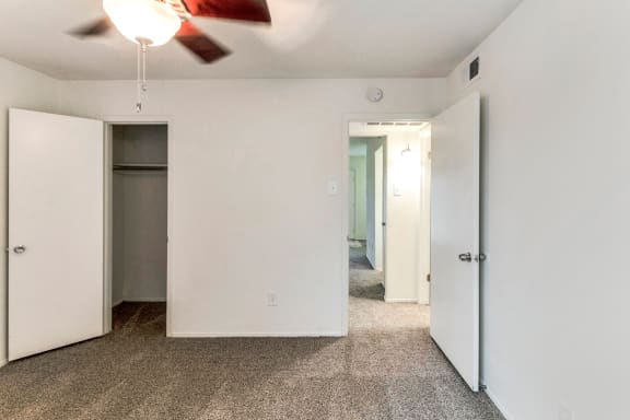 This is a photo of the bedroom in the 576 square foot 1 bedroom apartment at The Summit at Midtown Apartments in Dallas, TX.