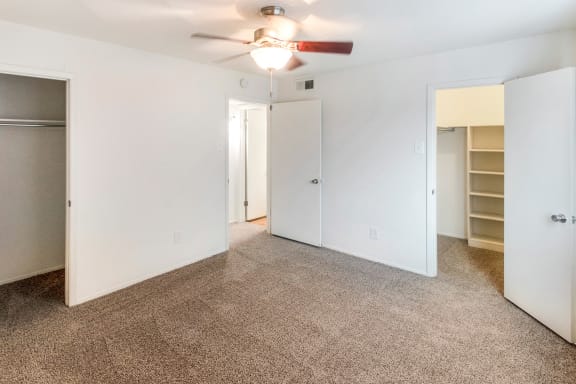 This is a photo of the bedroom closets in the 576 square foot 1 bedroom apartment at The Summit at Midtown Apartments in Dallas, TX.