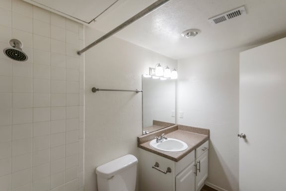 This is a photo of the bathroom in the 640 square foot 1 bedroom apartment at The Summit at Midtown Apartments in Dallas, TX.