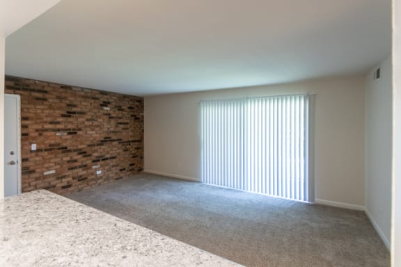 Living Room With Window Covering at Village East, Franklin