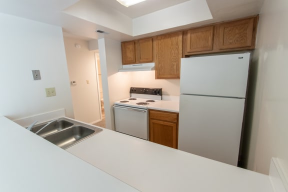 White Appliances In Kitchen at Village East, Ohio, 45005
