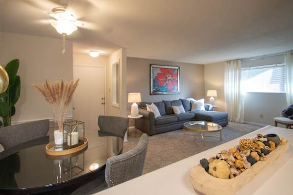 This is a photo of the living area from the kitchen in the 822 square foot, 2 bedroom, 1 bath floor plan at Village East Apartments in Franklin, OH.