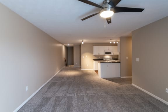 This is a photo of the living room in the 1170 square foot 2 bedroom, 2 bath Freedom Balcony at Washington Place Apartments in Miamisburg, Ohio in Washington Township.