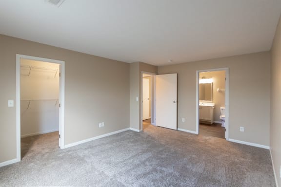 This is a photo of the primary bedroom in the 1170 square foot 2 bedroom, 2 bath Freedom Balcony at Washington Place Apartments in Miamisburg, Ohio in Washington Township.