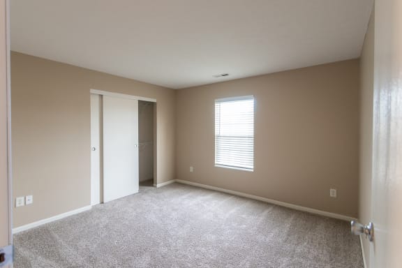 This is a photo of the second bedroom in the 1040 square foot 2 bedroom, 1 bath Patriot at Washington Place Apartments in Miamisburg, Ohio in Washington Township.