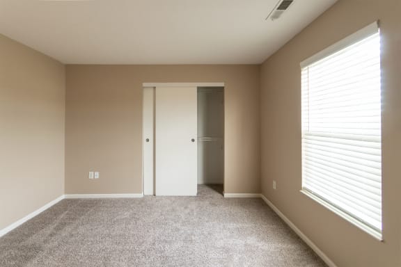 This is a photo of the second bedroom in the 1040 square foot 2 bedroom, 1 bath Patriot at Washington Place Apartments in Miamisburg, Ohio in Washington Township.