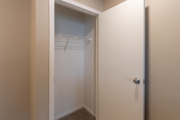This is a photo of the entryway coat closet in the 1040 square foot 2 bedroom, 1 bath Patriot at Washington Place Apartments in Miamisburg, Ohio in Washington Township.