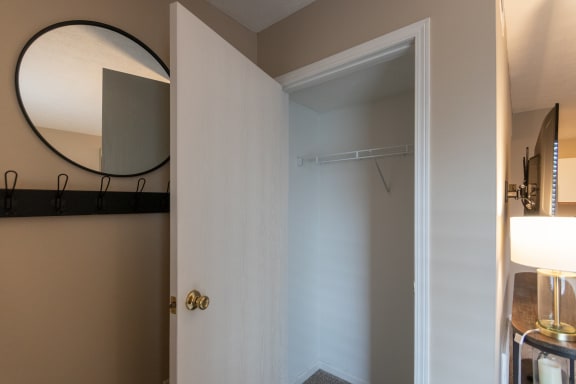This is a photo of the living room closet of the 890 square foot 2 bedroom, 2 bath Liberty at Washington Place Apartments in in Miamisburg, Ohio in Washington Township.