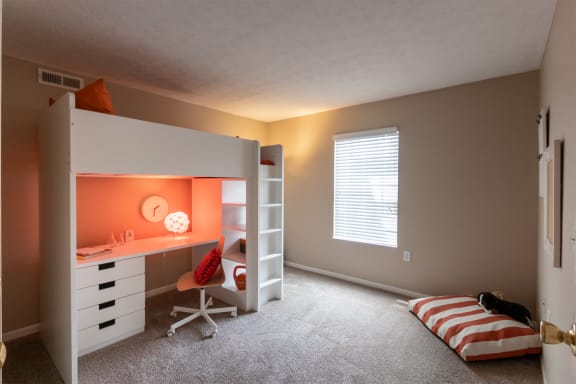 This is a photo of the second bedroom of the 890 square foot 2 bedroom, 2 bath Liberty at Washington Place Apartments in in Miamisburg, Ohio in Washington Township.