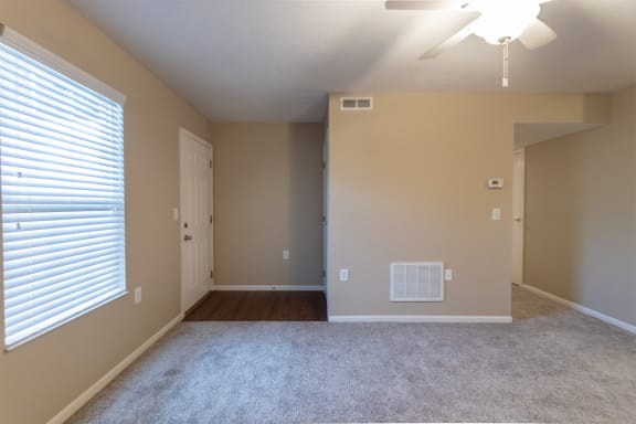 This is a photo of the living room in the 890 square foot 2 bedroom, 1 bath Liberty (lower) at Washington Place Apartments in Miamisburg, Ohio in Washington Township.
