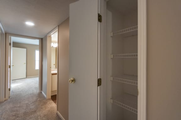 This is a photo of the hall linen closet in the 890 square foot 2 bedroom, 1 bath Liberty (lower) at Washington Place Apartments in Miamisburg, Ohio in Washington Township.