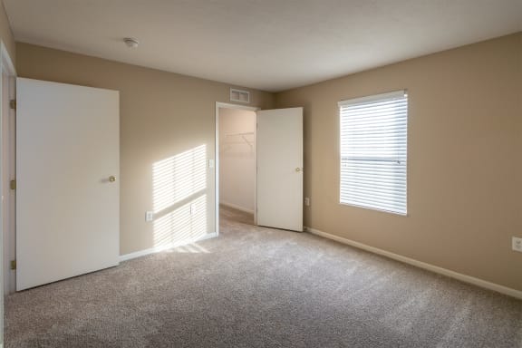 This is a photo of the primary bedroom in the 890 square foot 2 bedroom, 1 bath Liberty (lower) at Washington Place Apartments in Miamisburg, Ohio in Washington Township.