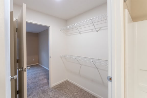This is a photo of the walk-thru closet in the bedroom in the 580 square foot 1 bedroom, 1 bath Independence at Washington Place Apartments in Miamisburg, Ohio in Washington Township.