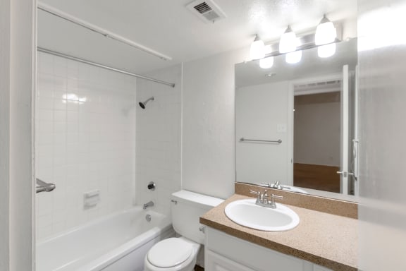 This is a photo of bathroom in the 751 square foot 1 bedroom apartment at Woodbridge Apartments in Dallas, TX.