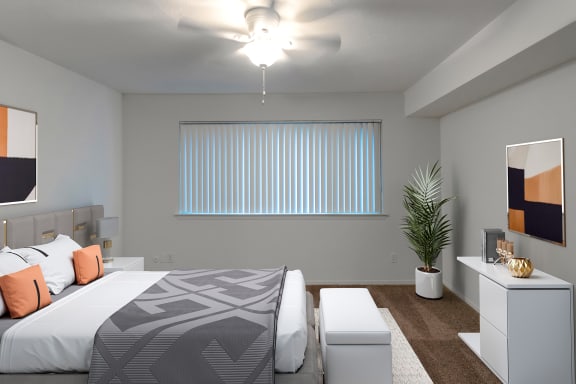 This is a photo of a virtually staged bedroom in the 751 square foot 1 bedroom, 1 bath apartment with fireplace at Woodbridge Apartments in Dallas, TX.