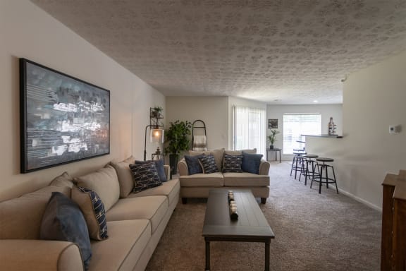 This is a photo of the living room of the 1100 square foot 2 bedroom Kettering floor plan at Washington Park Apartments in Centerville, OH.