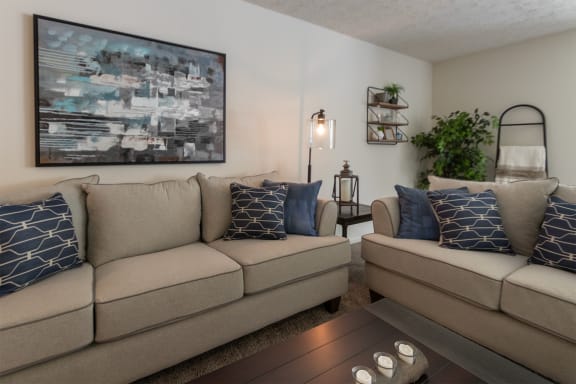 This is a photo of the living room of the 1100 square foot 2 bedroom Kettering floor plan at Washington Park Apartments in Centerville, OH.