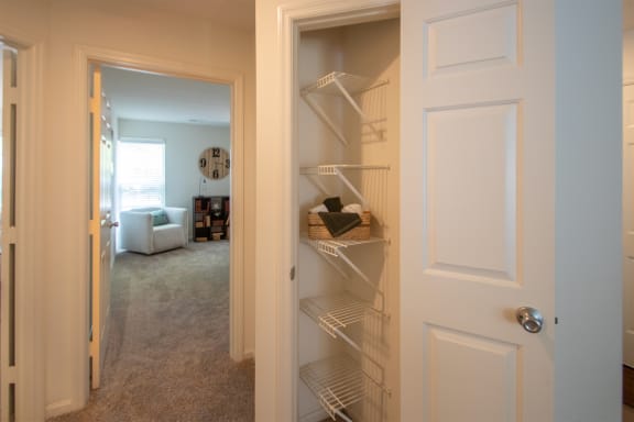 This is a photo of the hall linen closet of the 1100 square foot 2 bedroom Kettering floor plan at Washington Park Apartments in Centerville, OH.