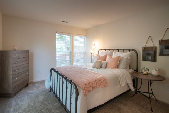 This is a photo of the primary bedroom of the 1100 square foot 2 bedroom Kettering floor plan at Washington Park Apartments in Centerville, OH.