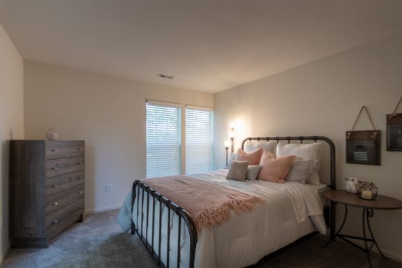 This is a photo of the primary bedroom in the 1100 square foot 2 bedroom Kettering floor plan at Washington Park Apartments in Centerville, OH.
