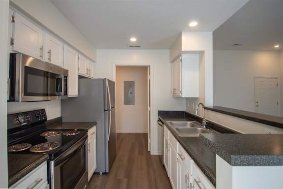 This is a photo of the kitchen of the 900 square foot 2 bedroom Miamisburg floor plan at Washington Park Apartments in Centerville, OH.