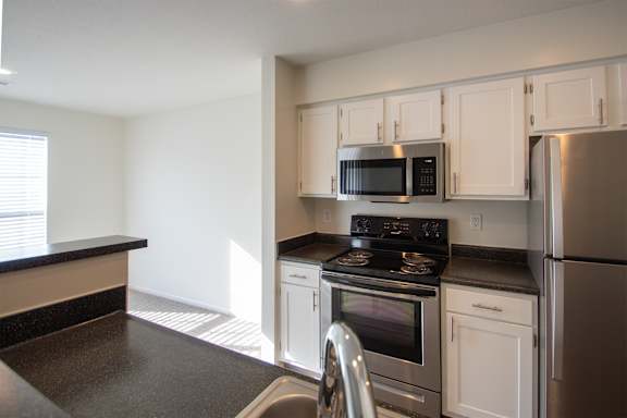 This is a photo of the kitchen of the 900 square foot 2 bedroom Miamisburg floor plan at Washington Park Apartments in Centerville, OH.