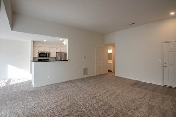 This is a photo of the living room of the 900 square foot 2 bedroom Miamisburg floor plan at Washington Park Apartments in Centerville, OH.