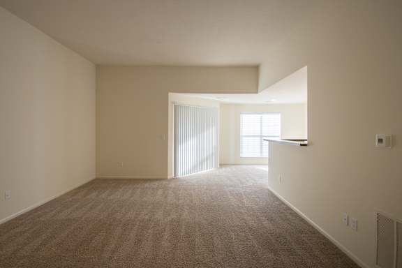 This is a photo of the living room of the 900 square foot 2 bedroom Miamisburg floor plan at Washington Park Apartments in Centerville, OH.